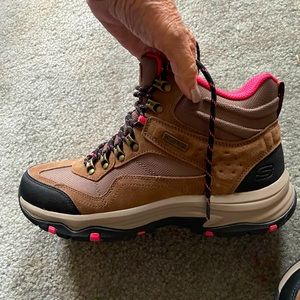 Woman’s sketchers, size 11, mountain boots. Never worn